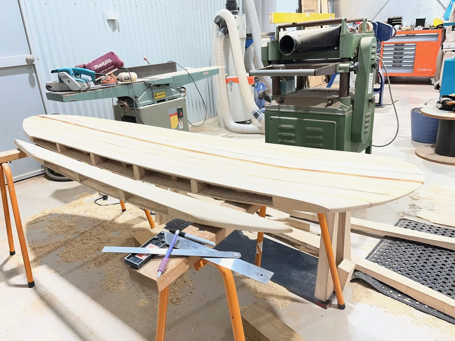 Tom's chambered Paulownia wooden surfboard under construction in Queensland