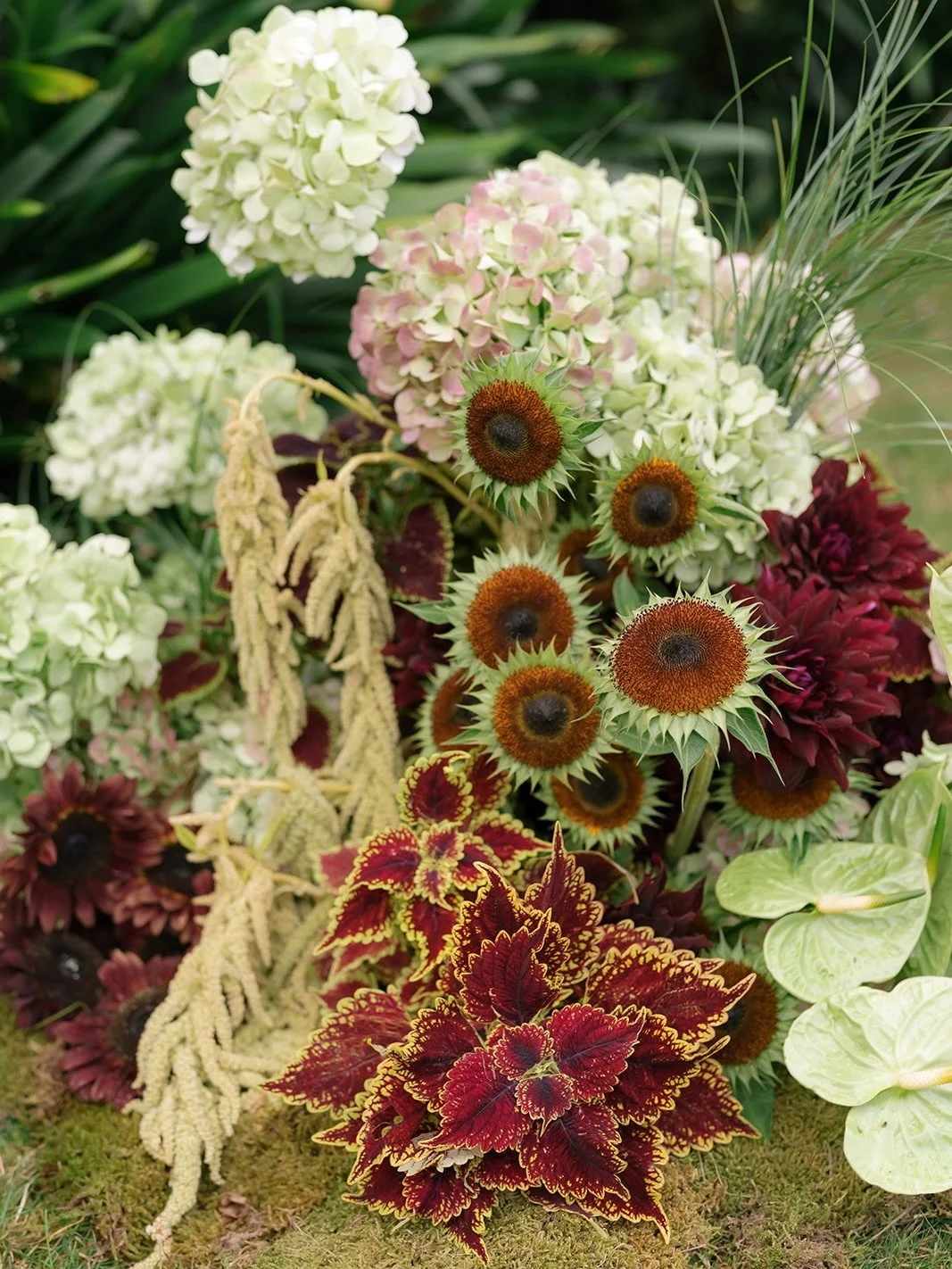A moment for the ceremony.. C&amp;P came to us with a sculptural brief and wanted to create something a little different for their day. We loved bringing these arrangements to life using plants, grasses and unique blooms to create something fun for t