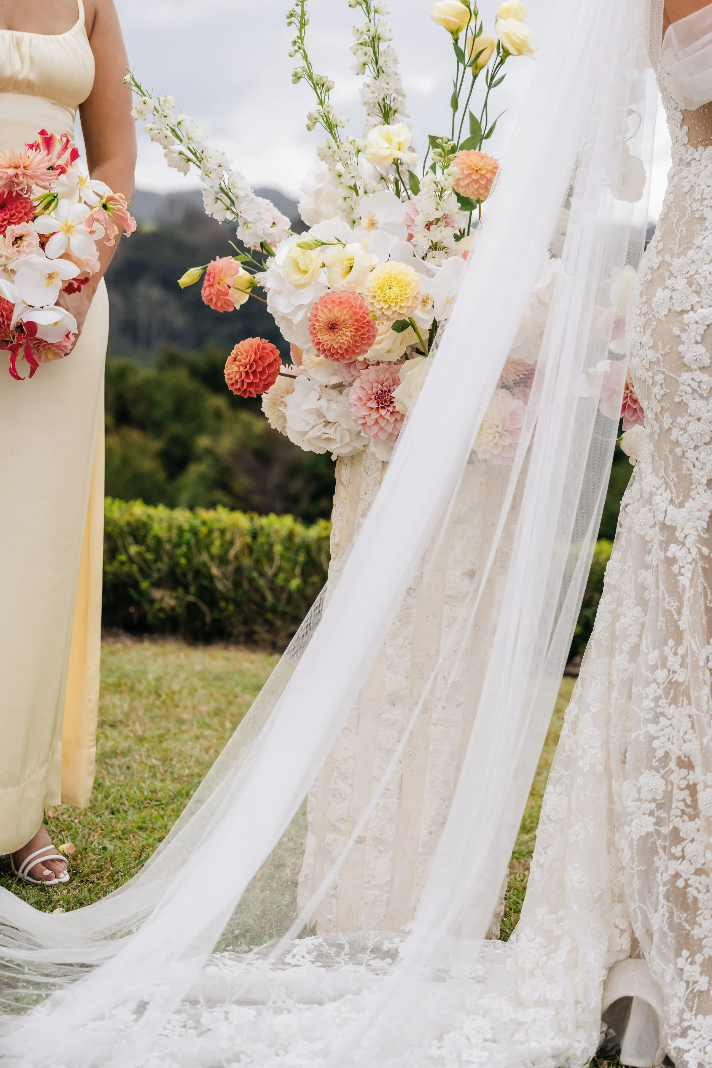 Pastel coloured florals on plinths