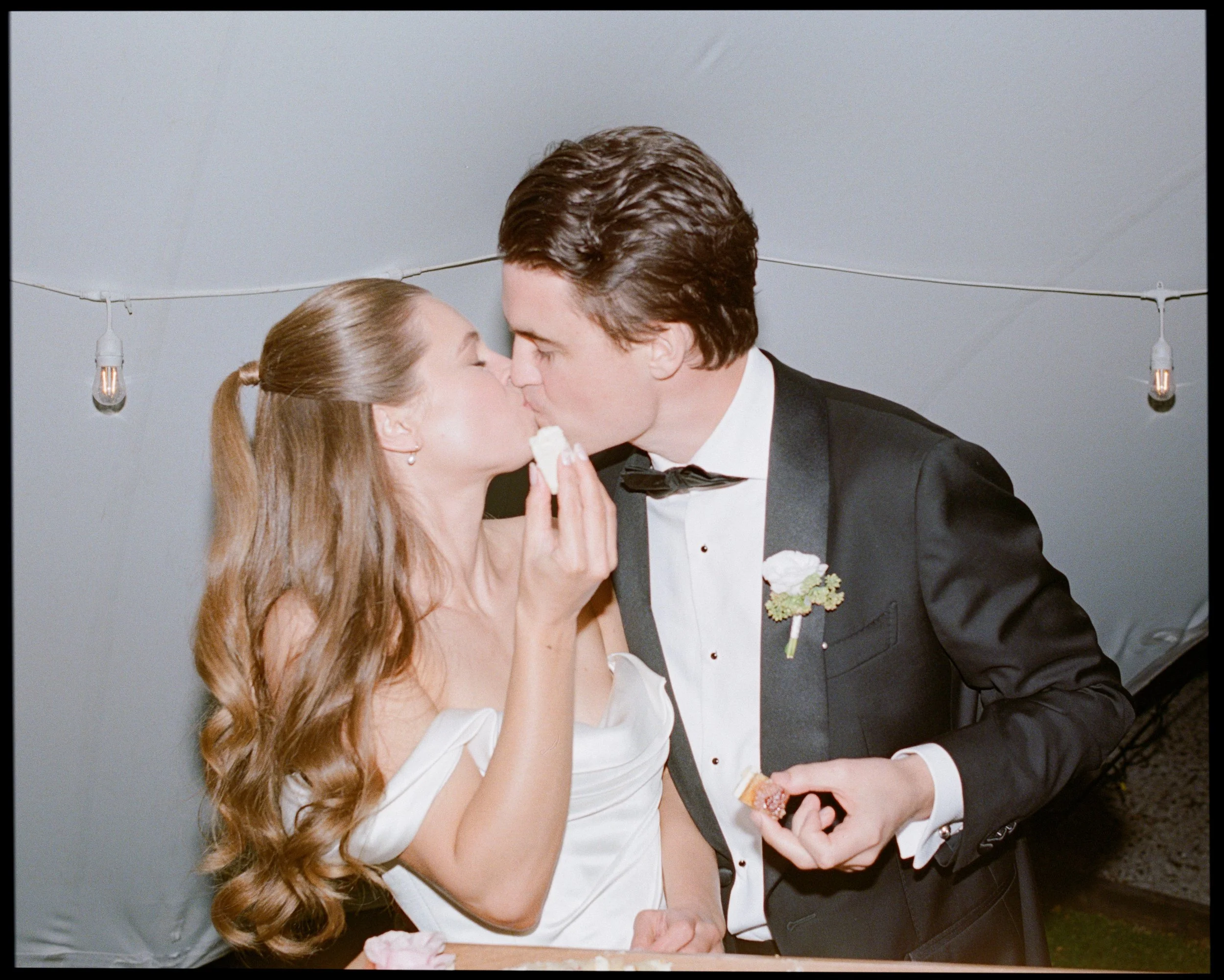 Bride and groom kissing