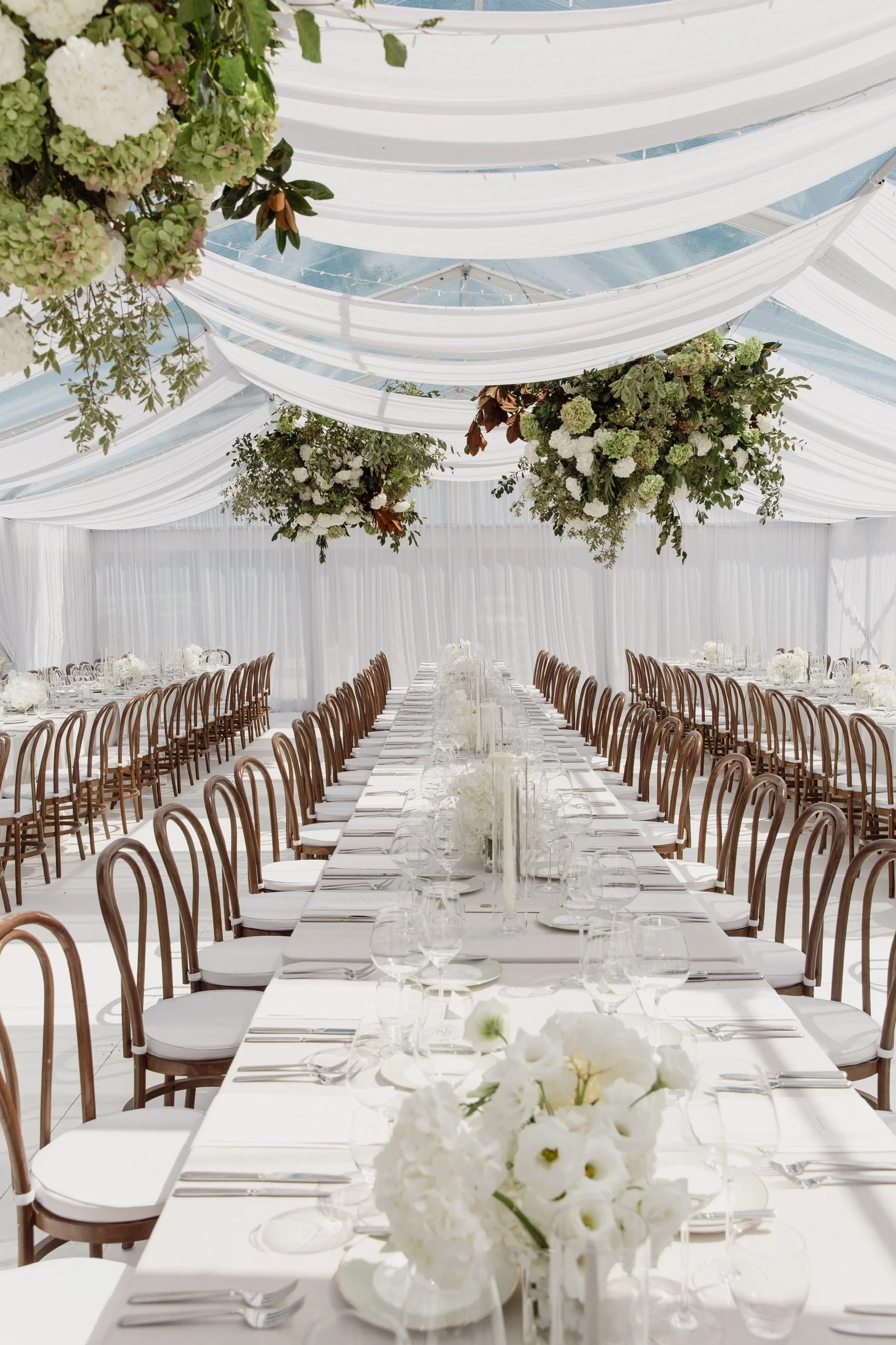 Lush hanging installation with foliage and hydrangea