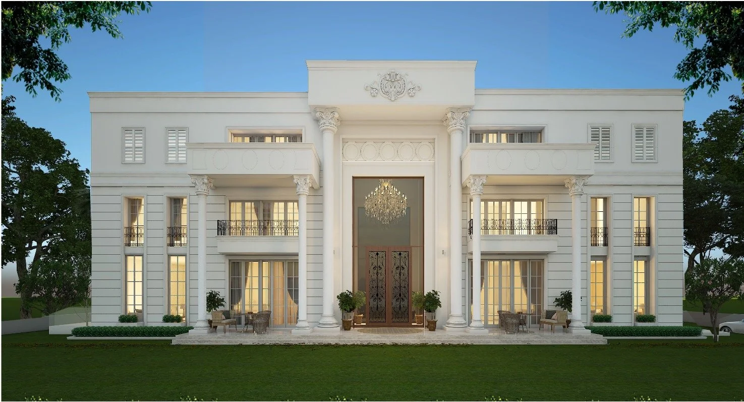 Front view of a large, white, neoclassical mansion with tall columns, balconies, and a chandelier visible through the central glass entrance door, surrounded by green lawn and trees.