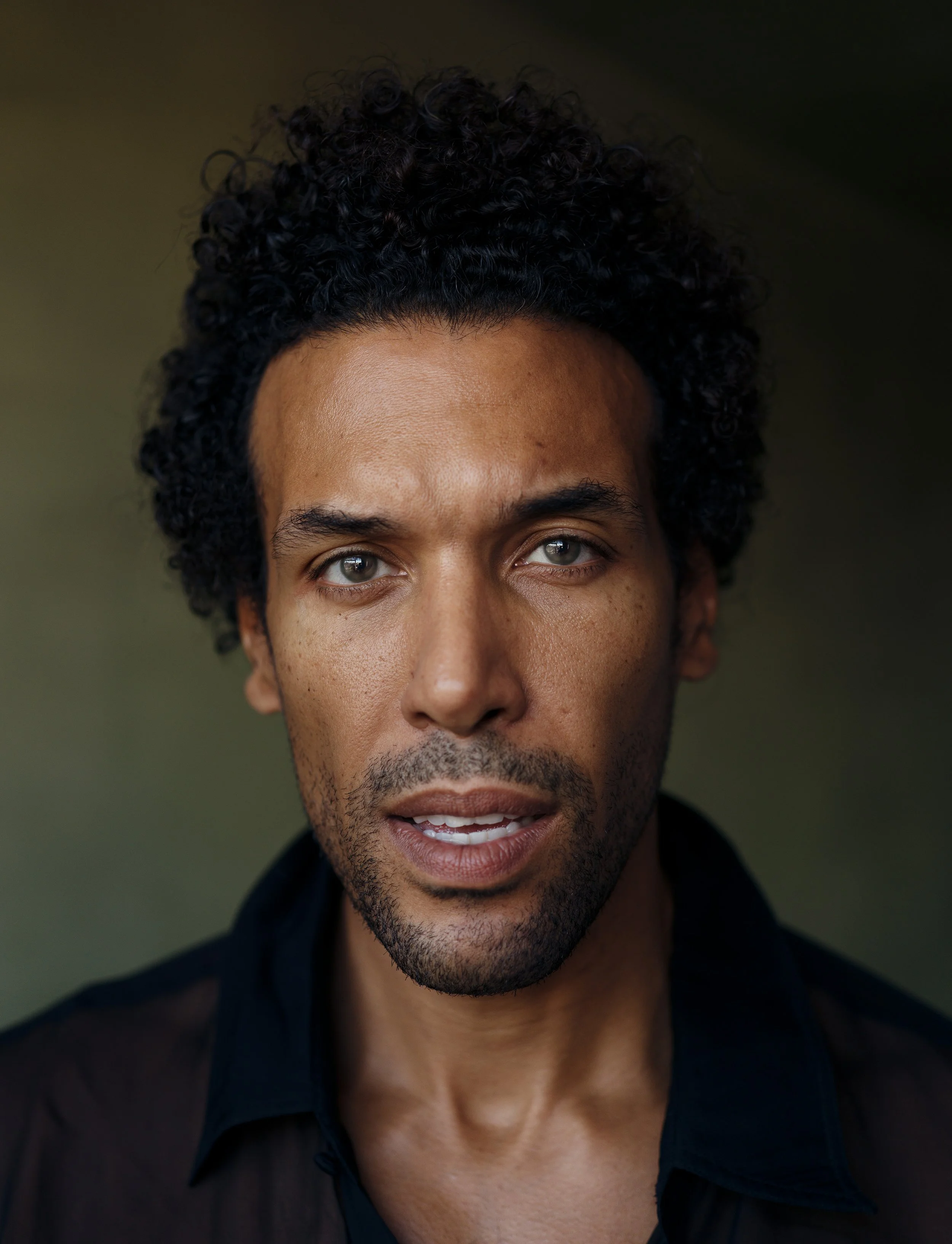 Headshot portrait of Ilan Evans taken by Chris Mann 
