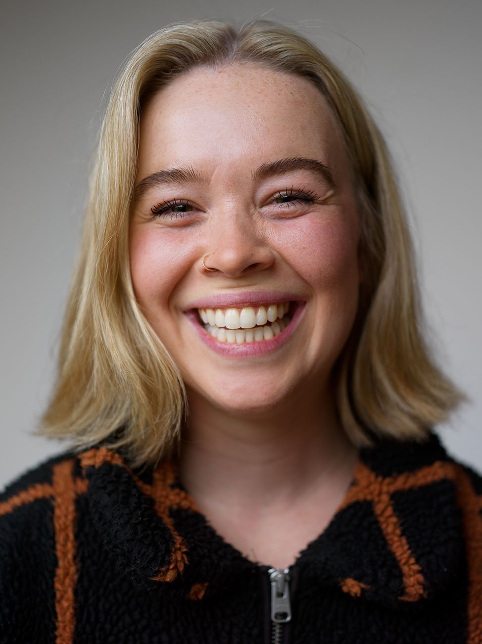 Happy headshot by Chris Mann
