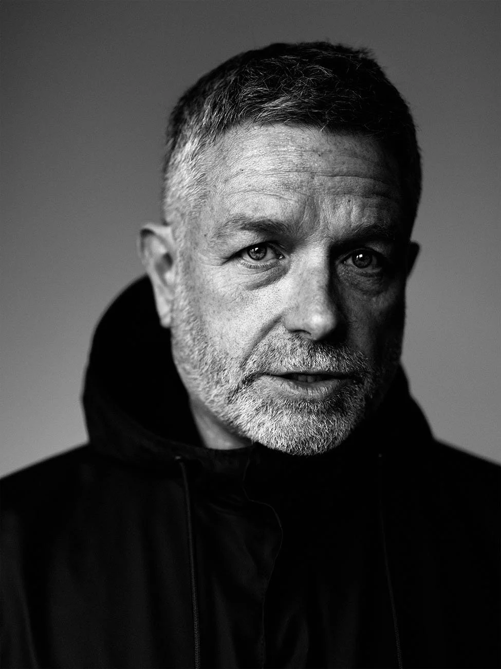 Black and white headshot of Matthew Dunster by Chris Mann
