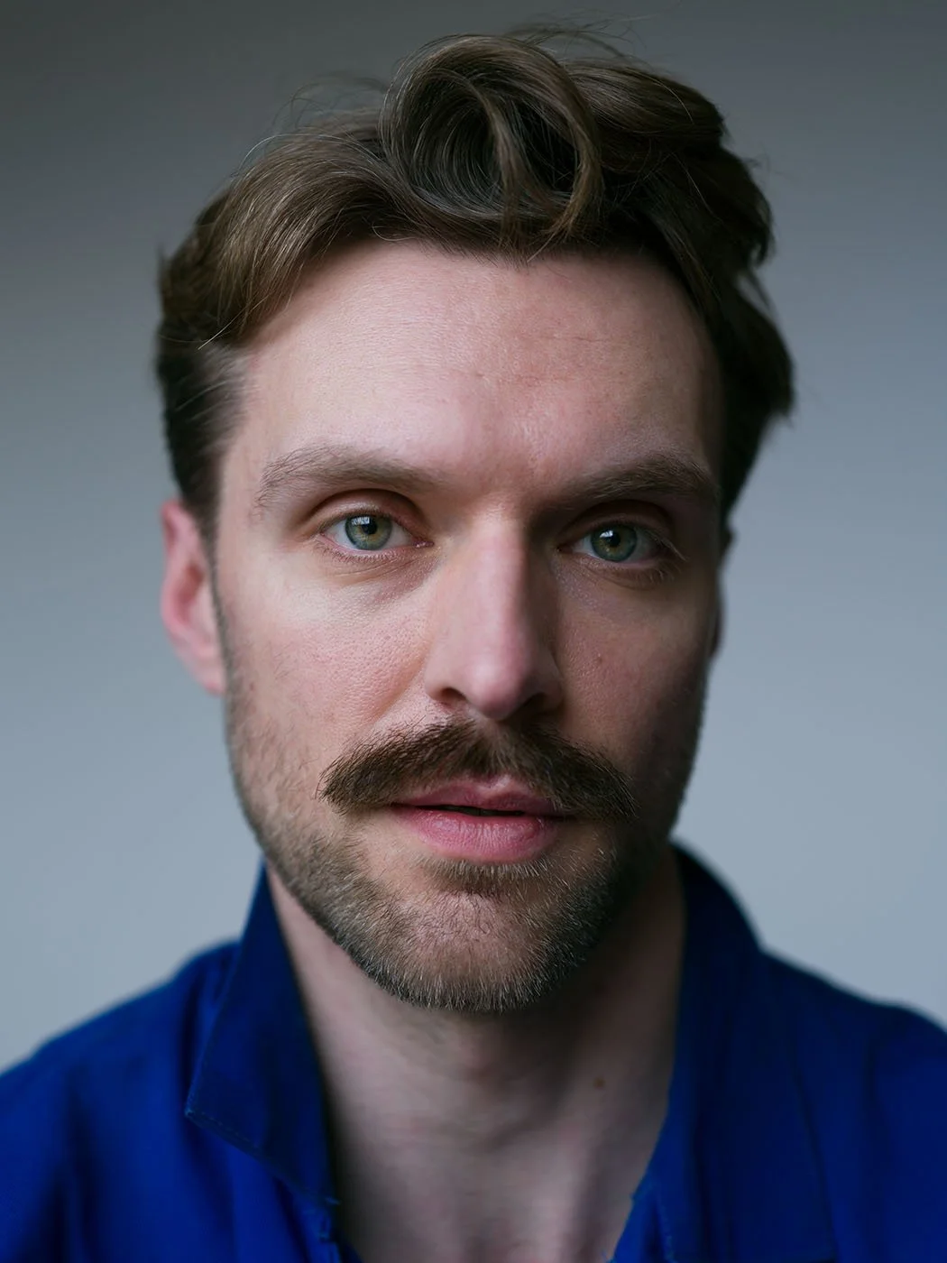 Simple professional headshot by Chris Mann