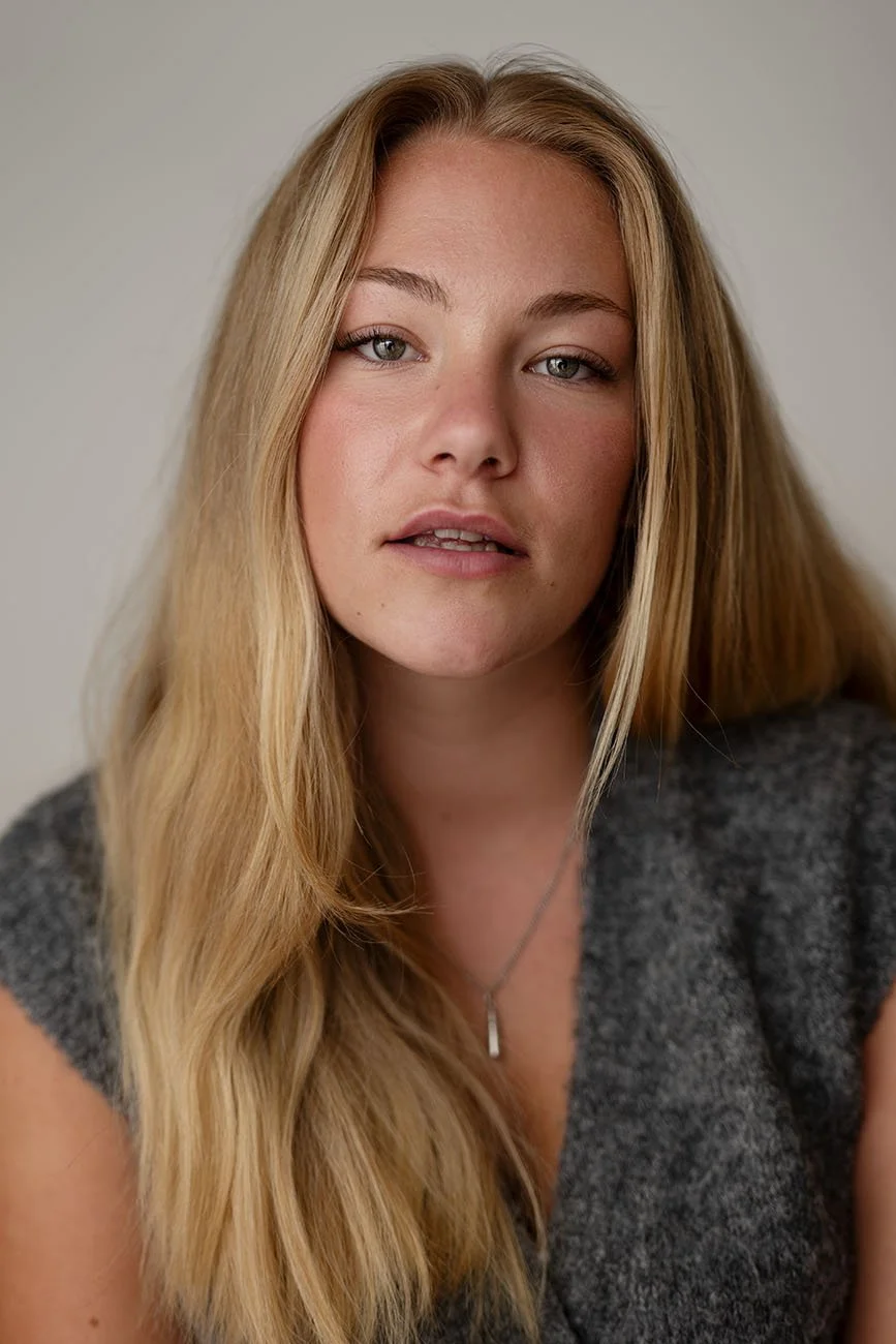 Headshot photograph taken by Chris Mann