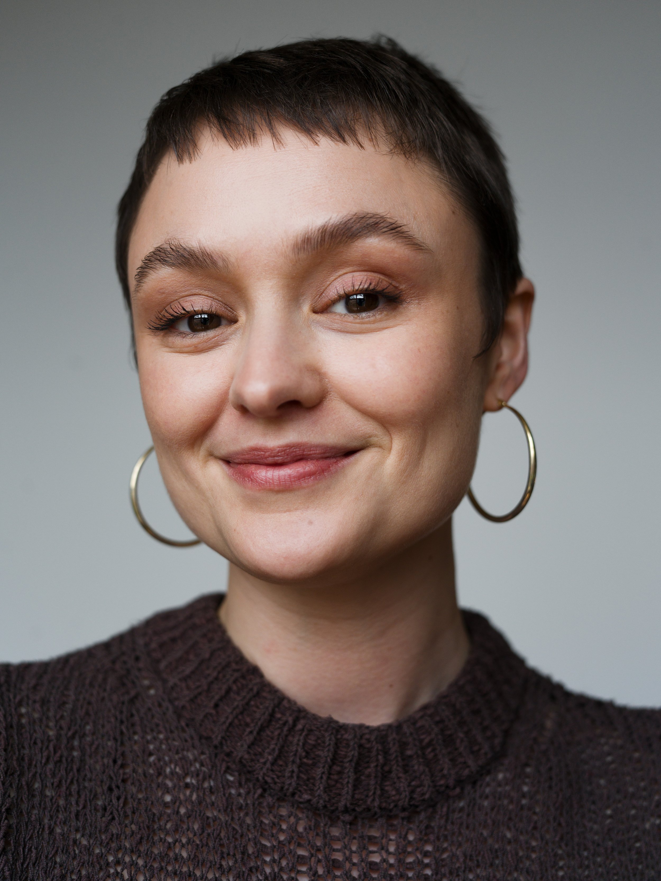 Smiling actress headshot taken by Chris Mann