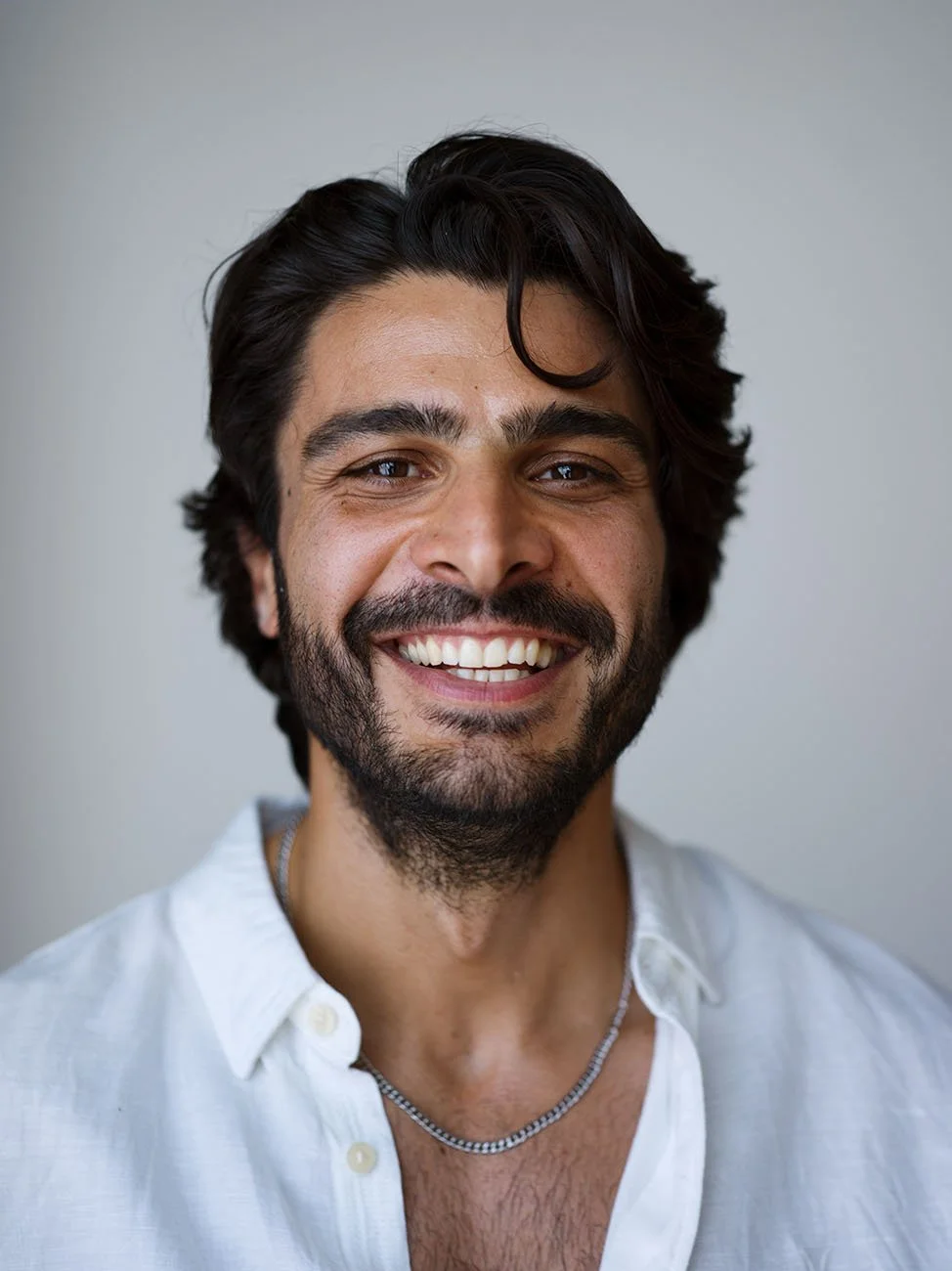 Smiling actors headshot taken by Chris Mann London