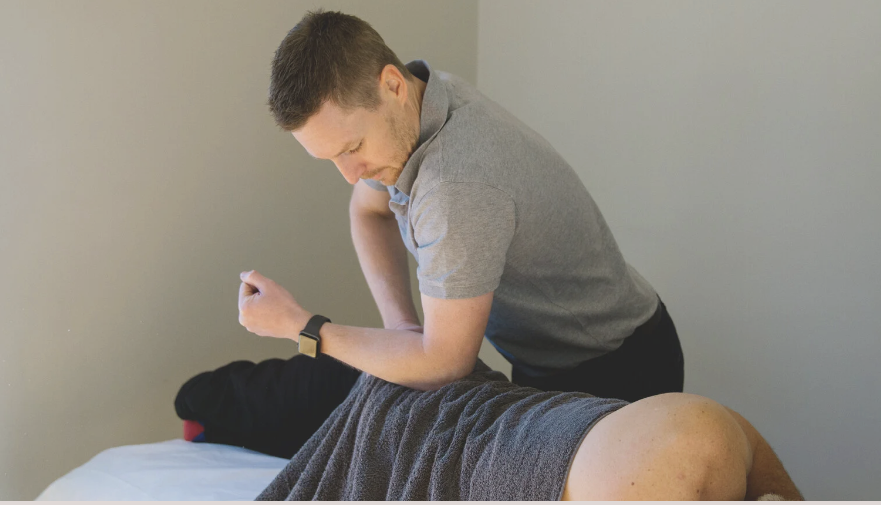 Dr Ross Boyd providing hands-on osteopathic treatment