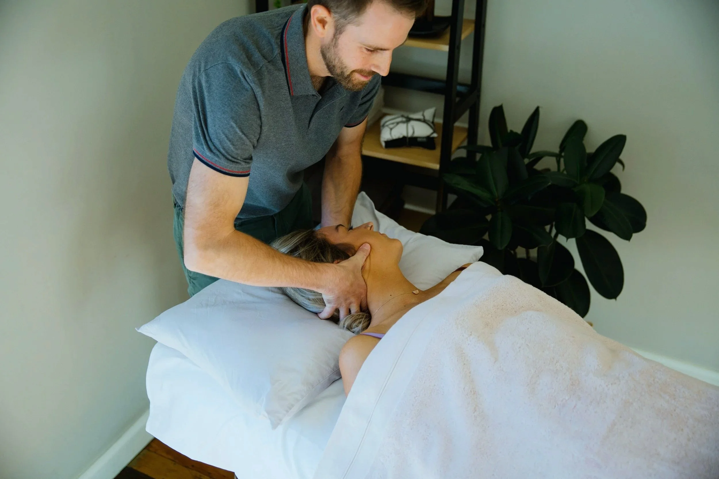 Osteopath providing hands-on treatment at Osteopathic Works in Mitcham
