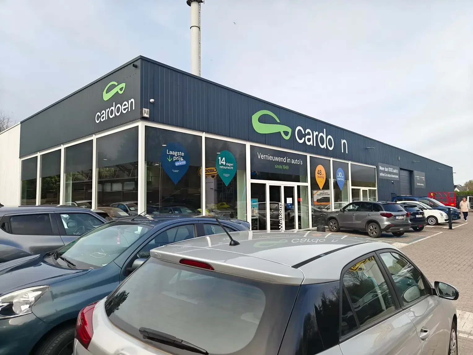 Spuitwerken gevel garage cardoen door master coating