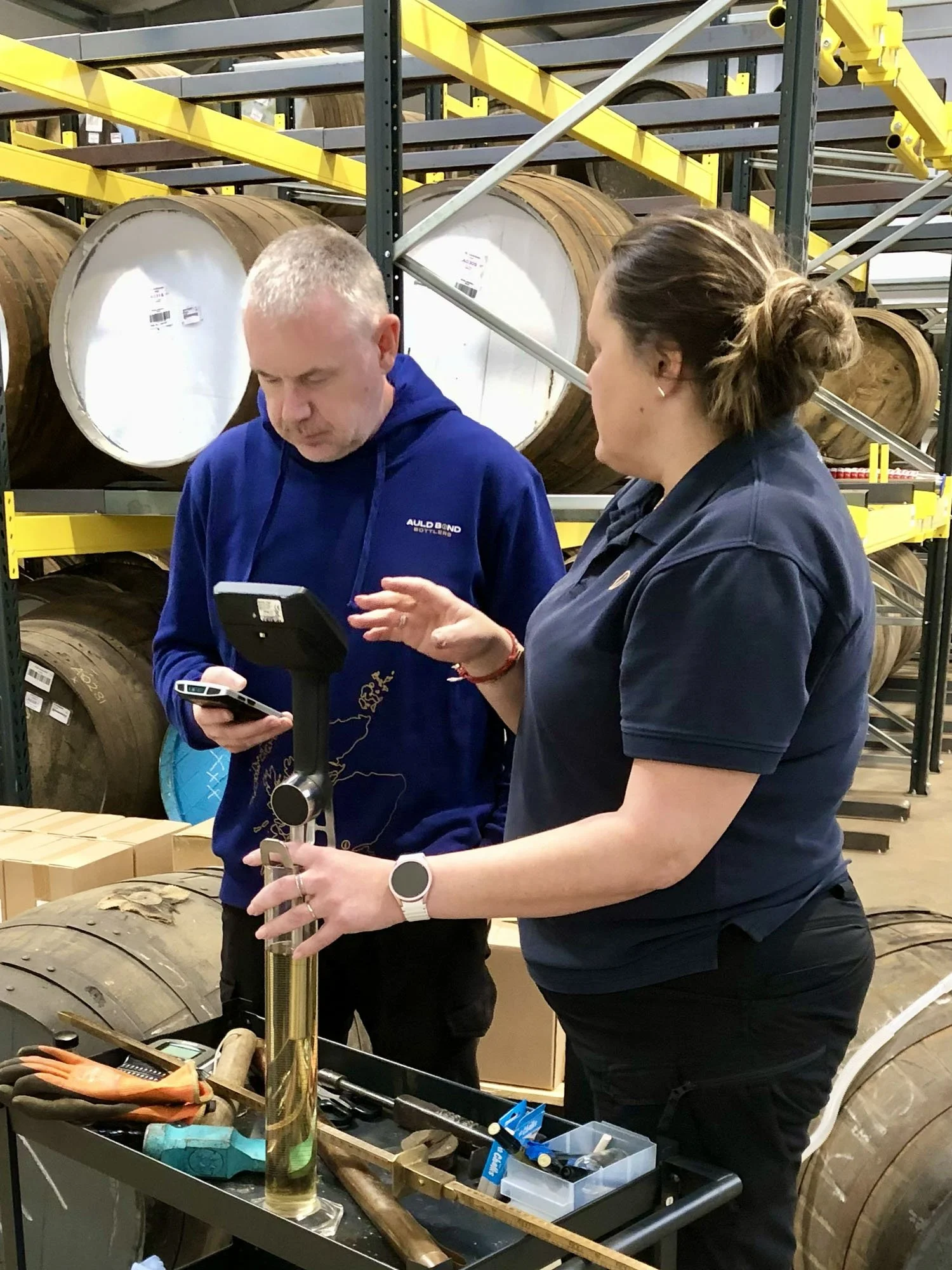 Auld Bond Bottlers team at work in their warehouse.