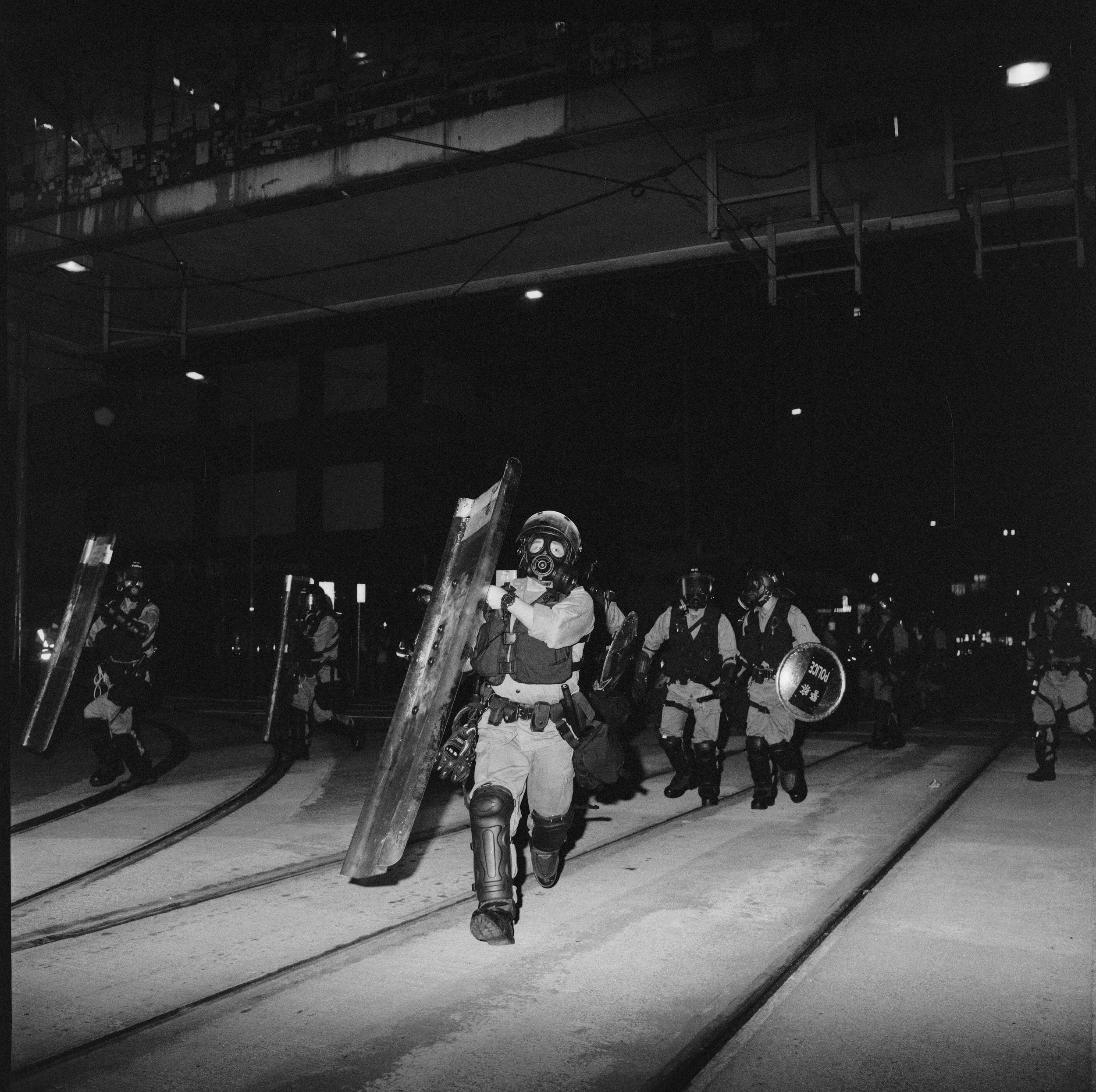 Hong Kong riot police, charge towards protestors during ongoing unrest in Hong Kong, 2020. Mamiya C330