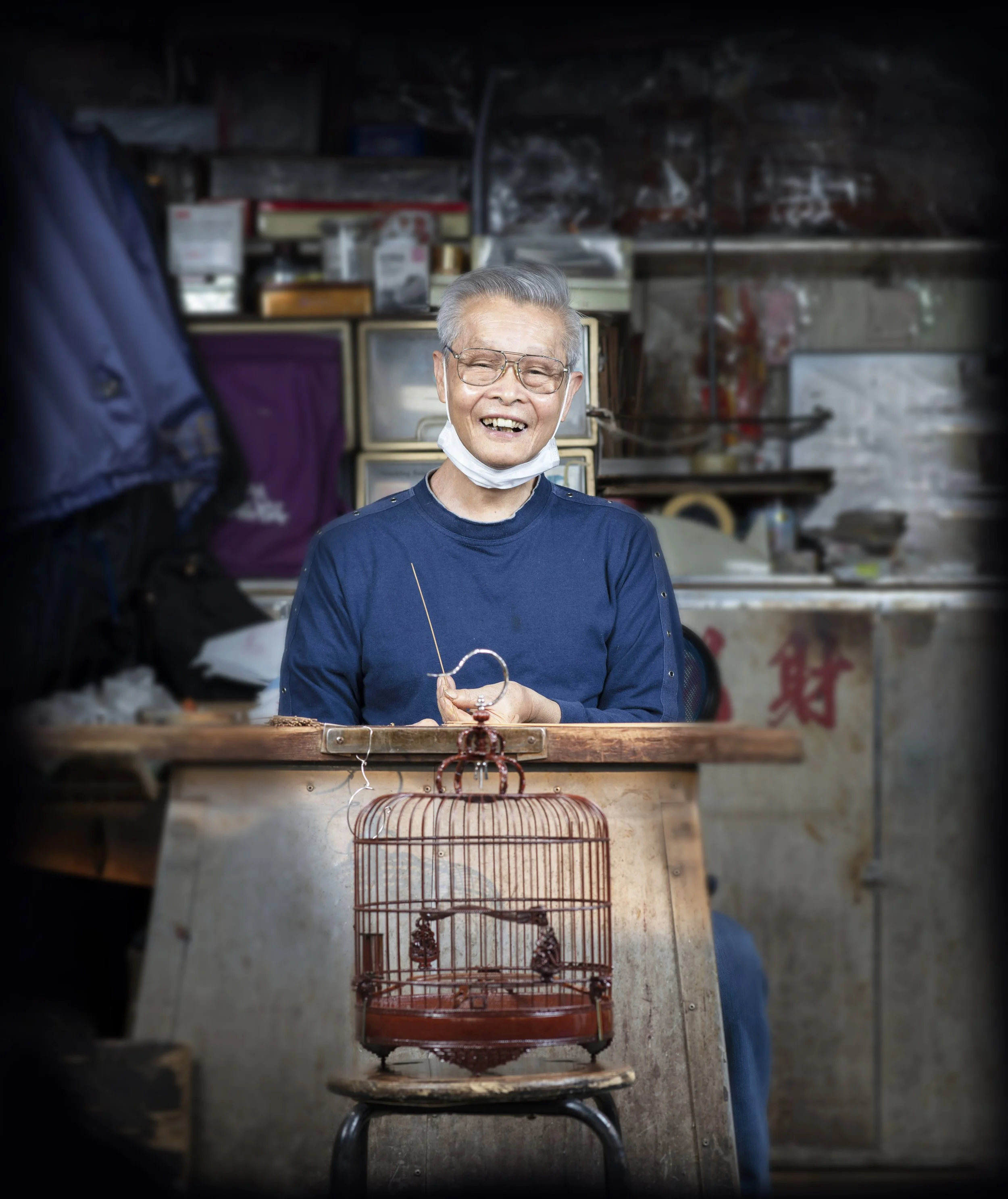 Hong Kong's last bird-cage maker, at his stall in Hong Kong.