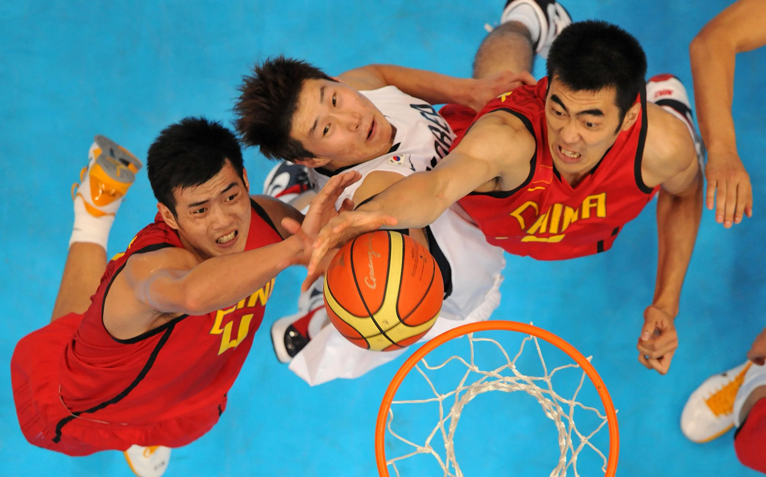 China and South Korea compete during the men's gold medal basketball game against South Korea at the Guangzhou international sport arena during the 16th Asian Games on November 26, 2010.