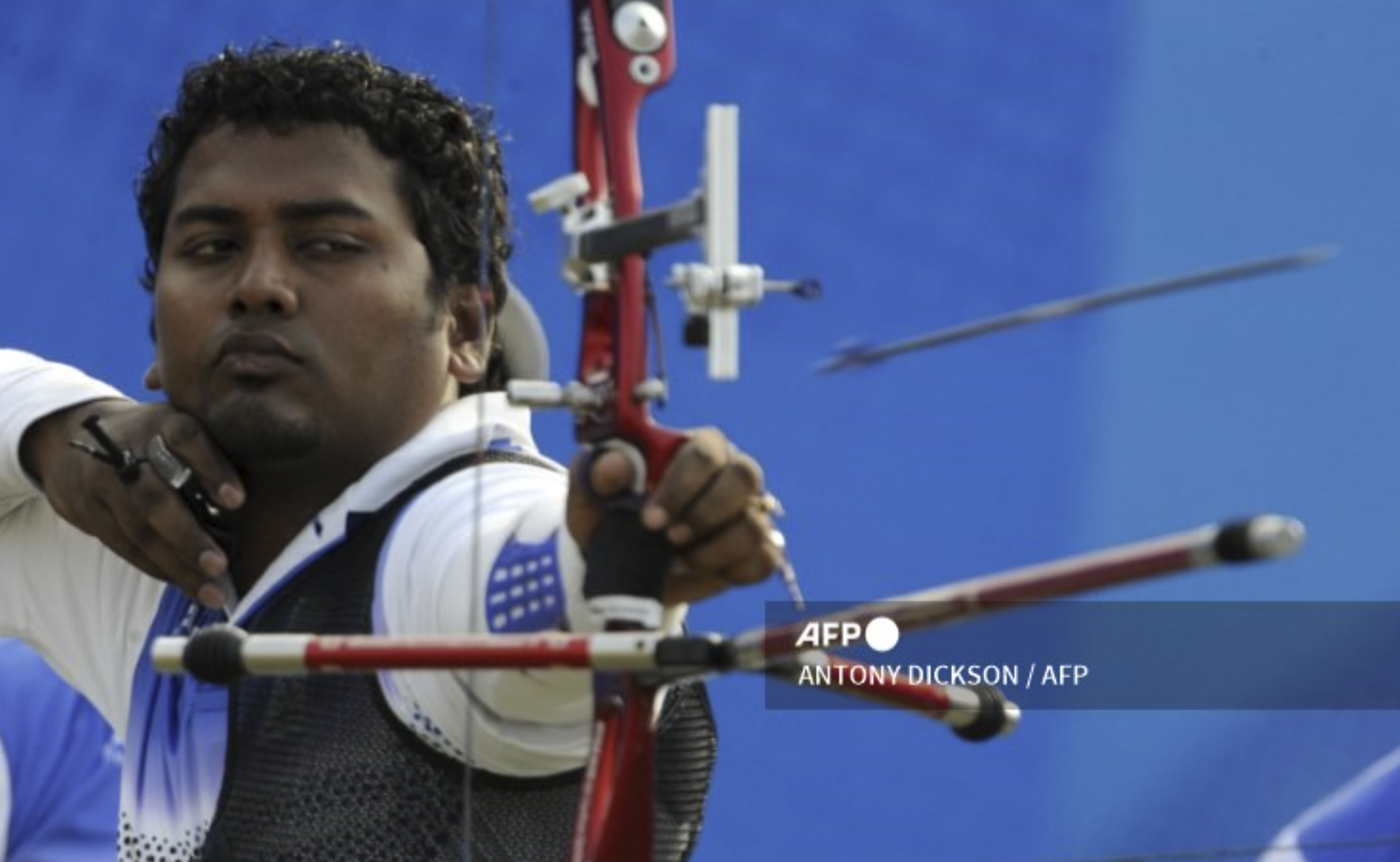 Jayanta Talukdar of India releases an arrow during the 16th Asian Games on November 22, 2010. Agency France-Presse