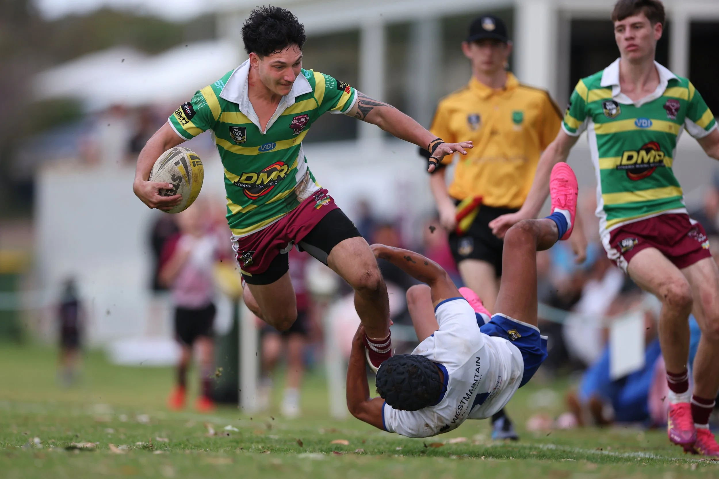Hare from the North Beach Sea Eagles flies through a tackle, Rugby League, 2026