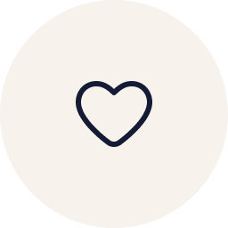 A navy blue heart icon centered on a white circular background.