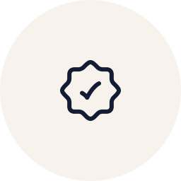 A badge icon with a checkmark inside