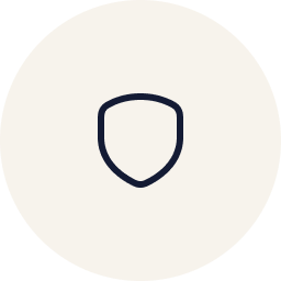 A simple, minimalistic outline of a shield on a light background.