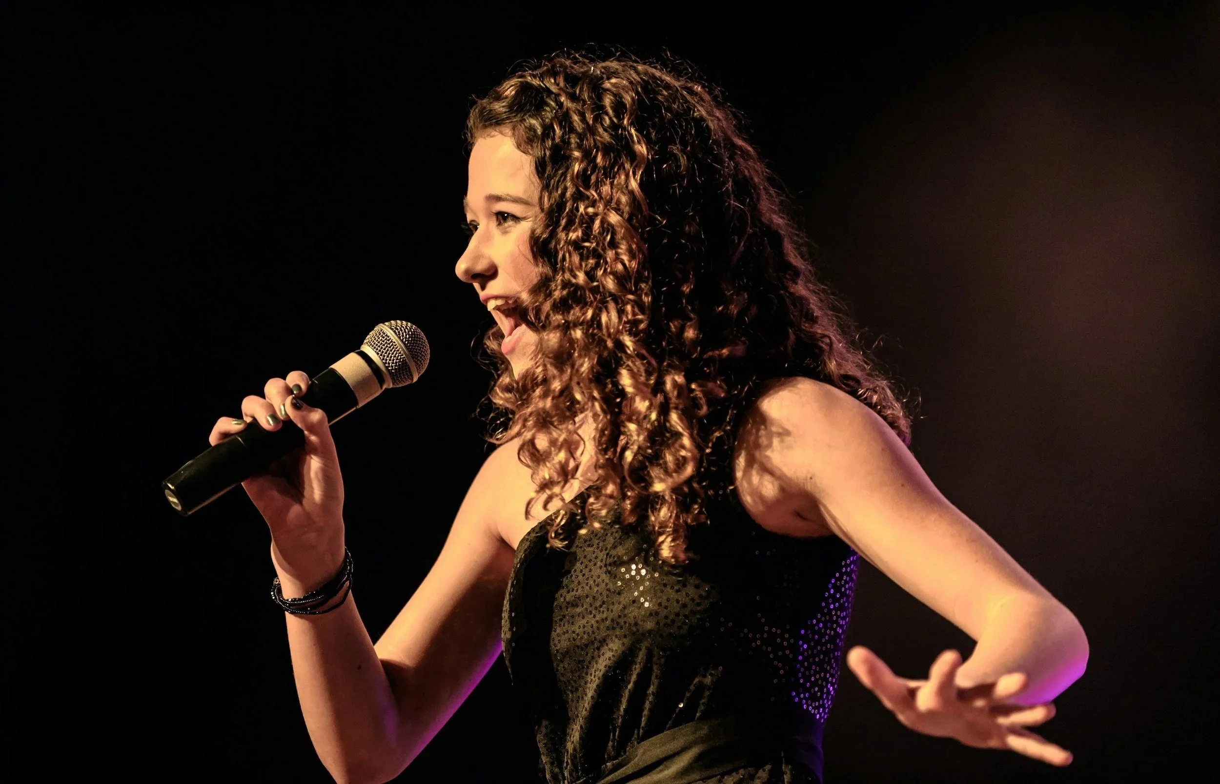 Teen singer performing musical theatre, voice lessons at Spotlight Vocal Lab in Pleasantville NY