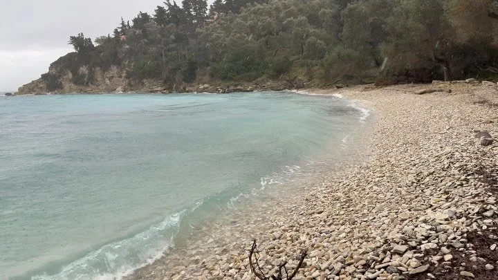 Wind and rain whipping Marmari beach. Still got out for winter cold water swim. Pretty amazing experience. Nothing beats warming up by roaring fire afterwards. 🔥 #paxos #winterswimming #pristine