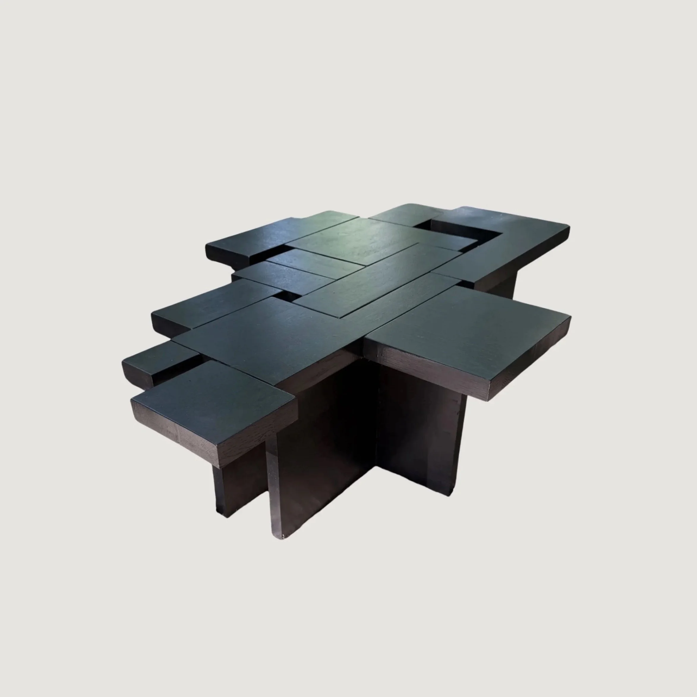 Modern sculptural solid oak coffee table by KHARAD STUDIO with geometric design.