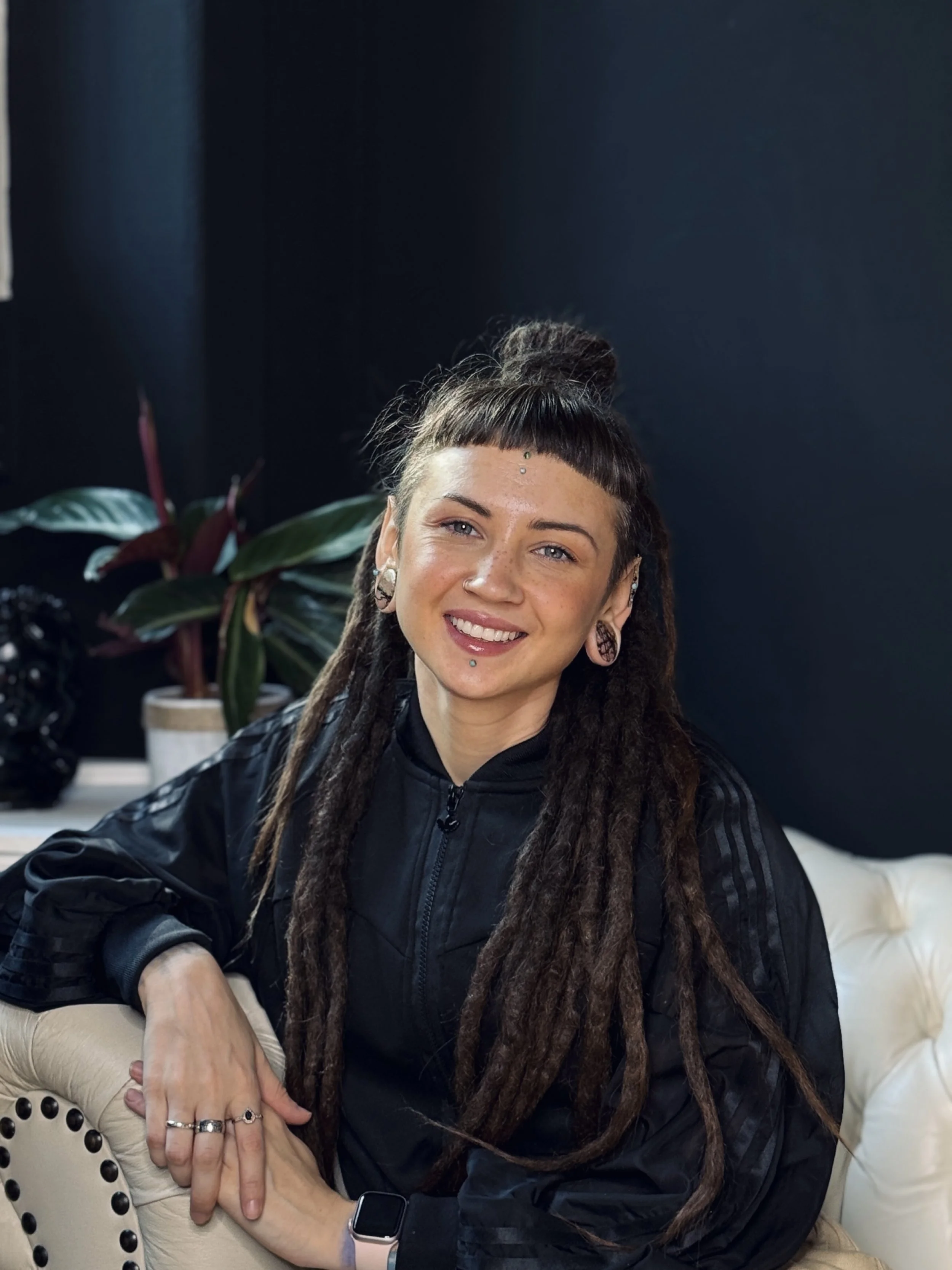 Portrait of tattoo artist Maya Marina in the studio.