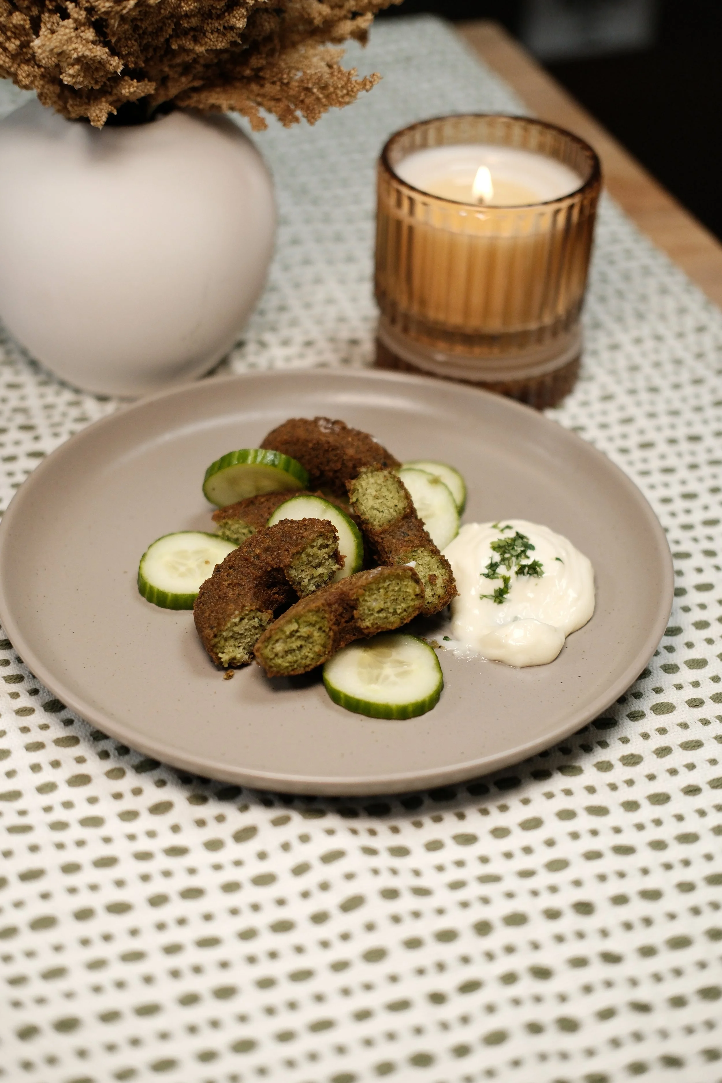 Housemade falafel bites served with cucumber and garlic sauce.