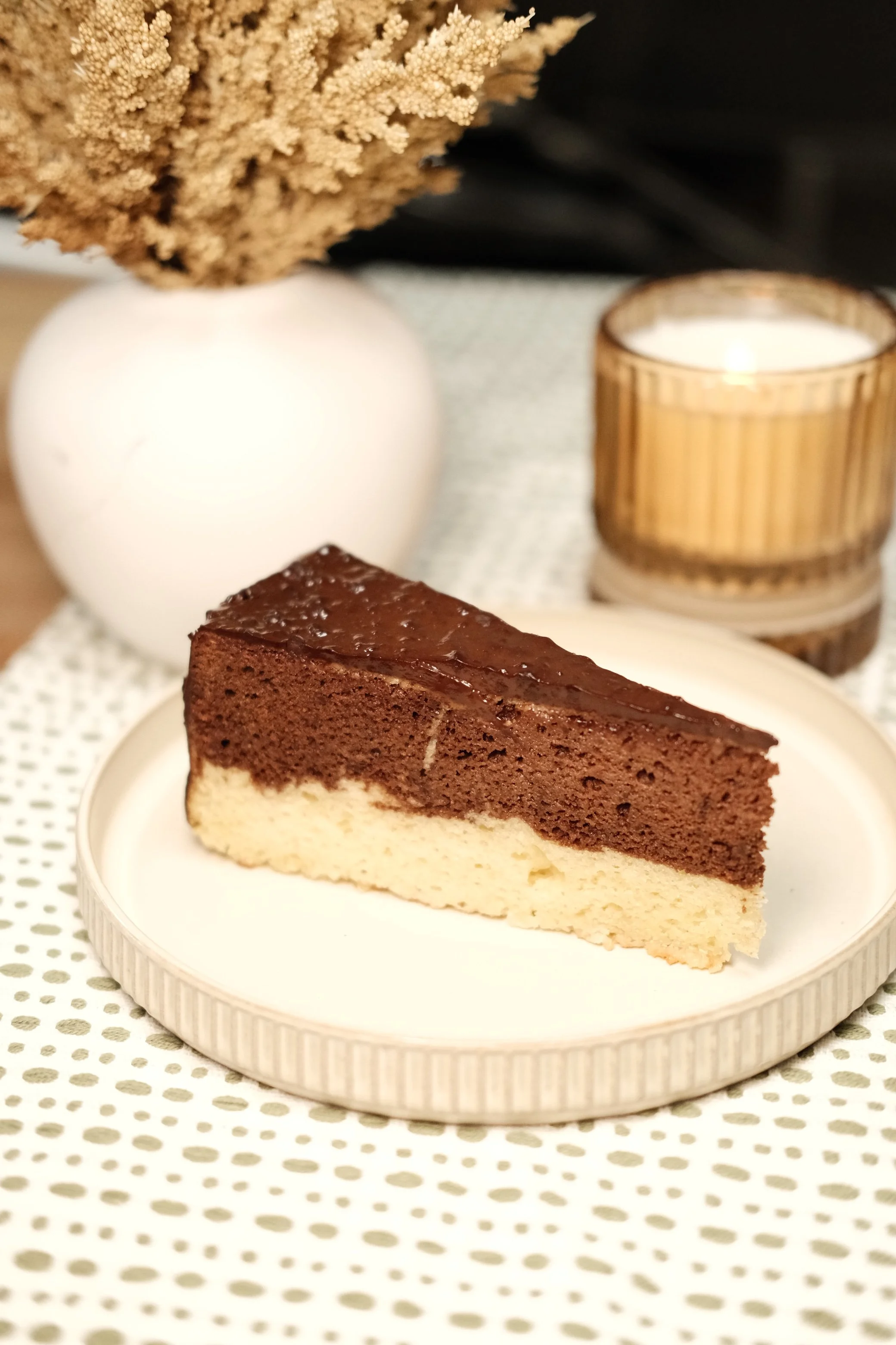 Housemade marble cake topped with chocolate ganache at Pita & Maíz.