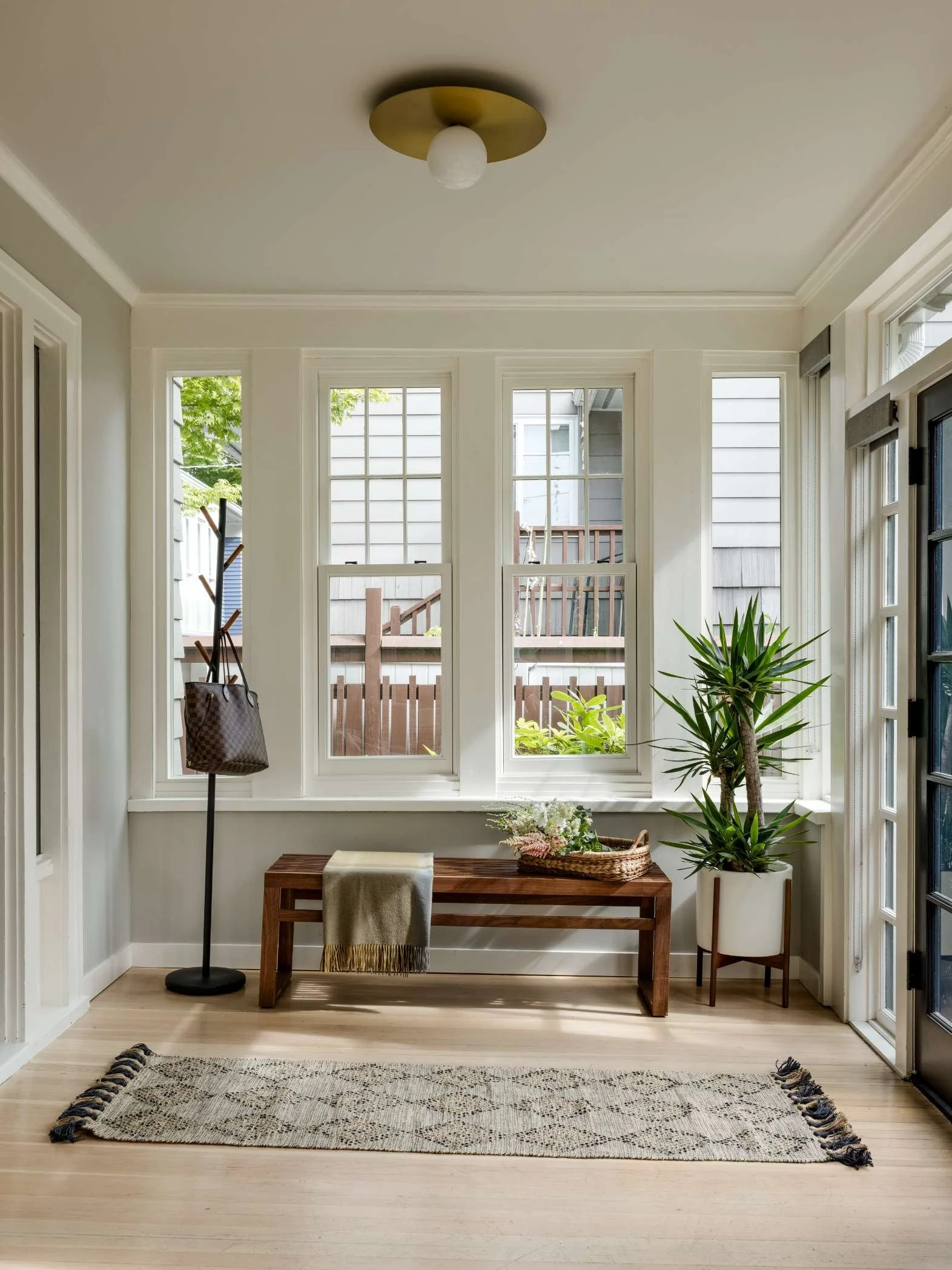 Queen Anne Craftsman; room and board walnut bench; visual comfort lighting;