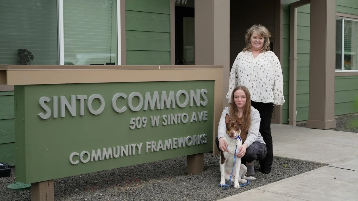 Woman and daughter standing outside of Sinto Commons property in Spokane, WA