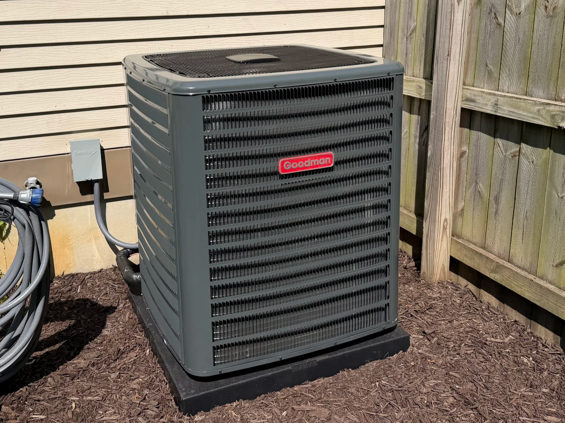 An outdoor Goodman air conditioning unit installed at a client's home in Byron Center.