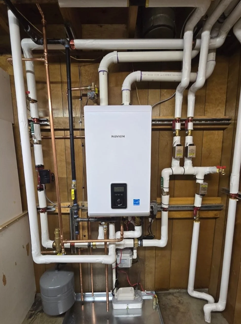 A Navien combi-boiler installed in a Grand Rapids basement