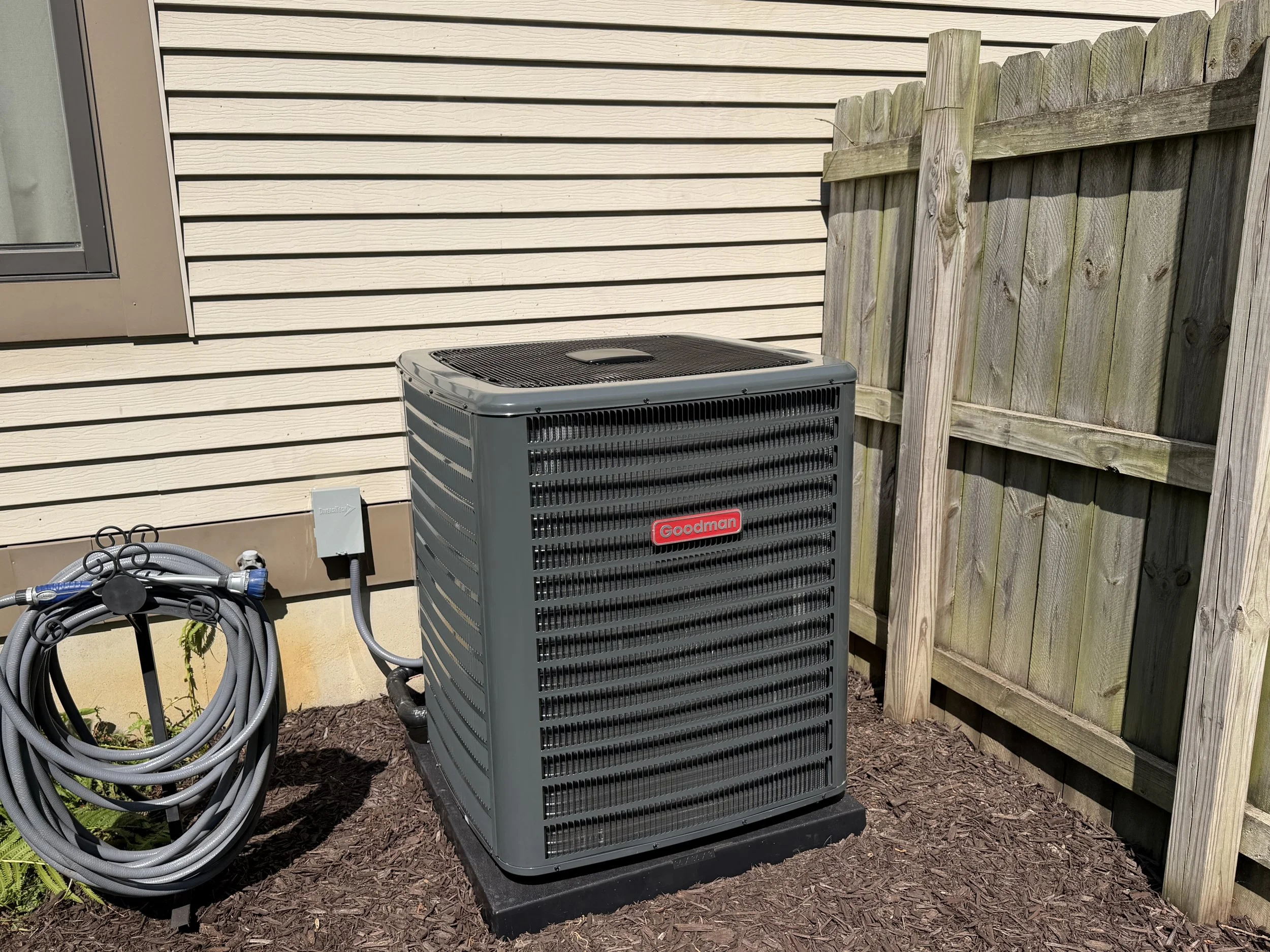 Goodman A/C installed outside a Byron Center home