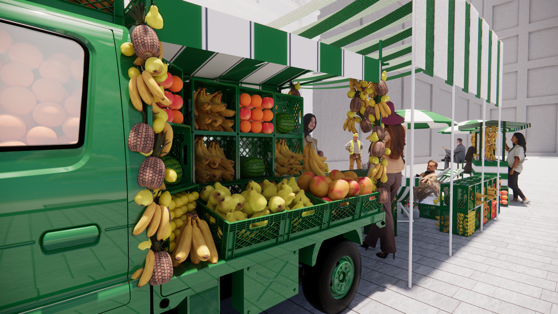 A mobile fruit stand with green and white striped awnings selling bananas, apples, pears, watermelons, and pineapples at an outdoor market. There are a few people shopping and talking to vendors.