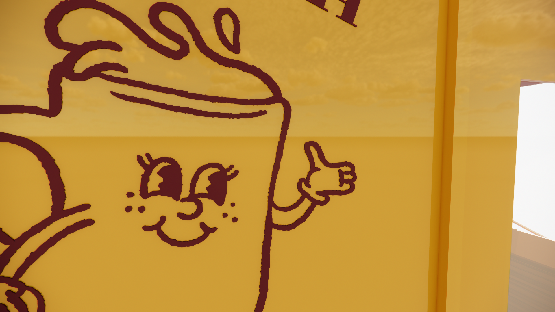 Close-up of a yellow surface featuring a line drawing of a person with a hat, smiling, giving a thumbs-up, and with bunny-like ears.