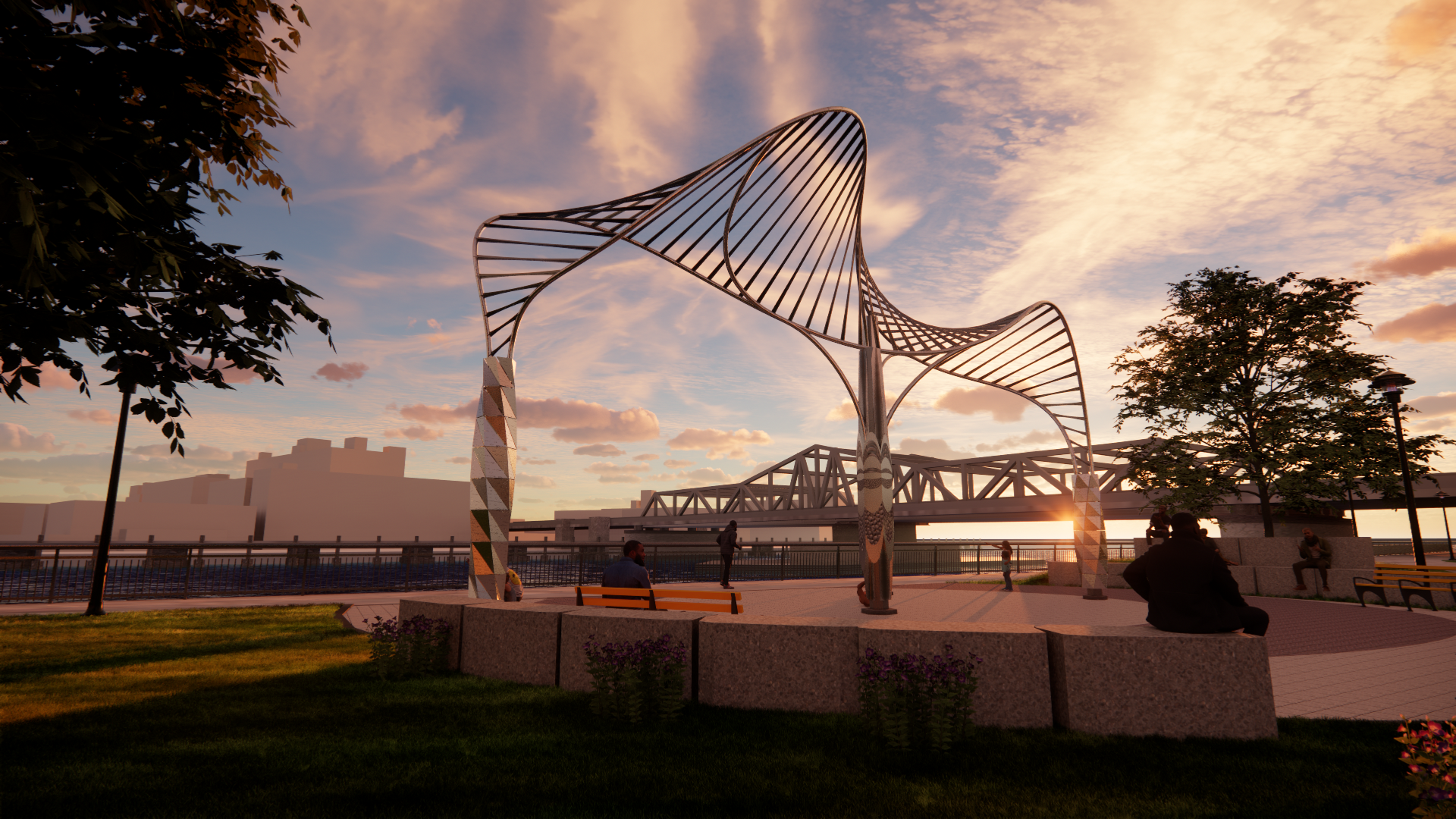 An outdoor park at sunset with a modern, artistic metal sculpture resembling a butterfly. Several people are sitting on benches or standing nearby, with trees and a bridge in the background.