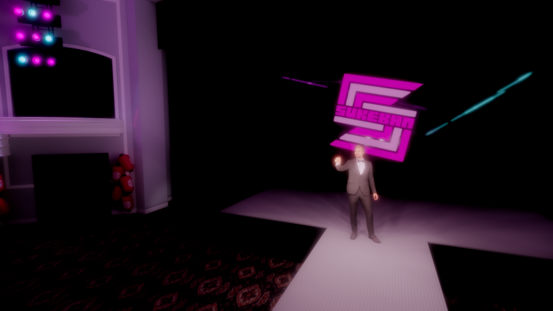 A man in a tuxedo standing on a stage with a large pink and purple sign that reads "SURGEARN." The stage is dark with bright pink and blue lights overhead.