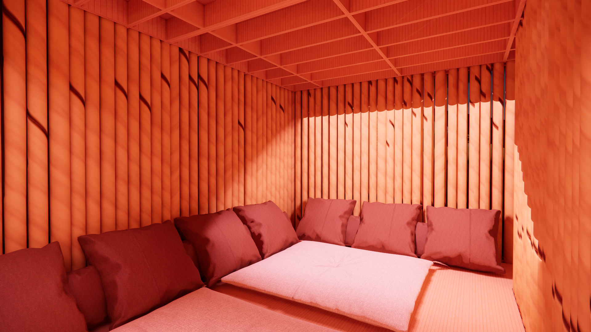 Interior of a cozy room with orange vertical fabric wall coverings and matching pillows on a pink sofa.