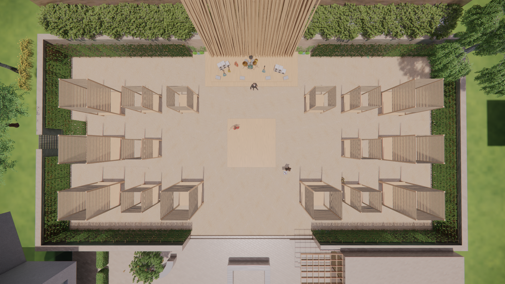 A bird's eye view of an outdoor communal space with outdoor cabins, a stage area with musical instruments, and surrounding greenery.