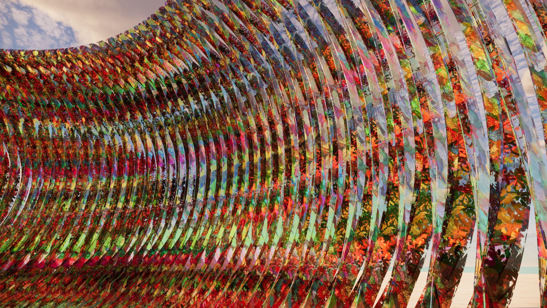 Colorful artistic installation with curved, overlapping, and transparent strips creating a layered, wave-like pattern against a partly cloudy sky.