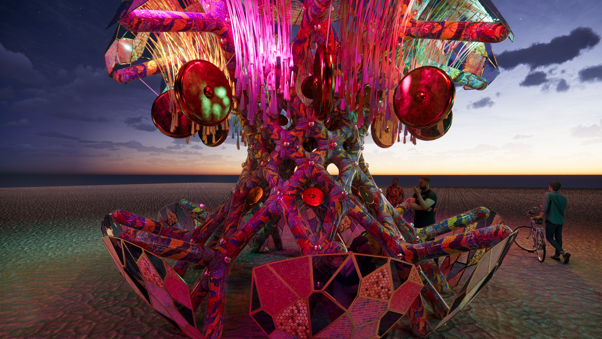 Colorful, abstract sculpture on a beach at sunset with four men and a bicycle nearby.
