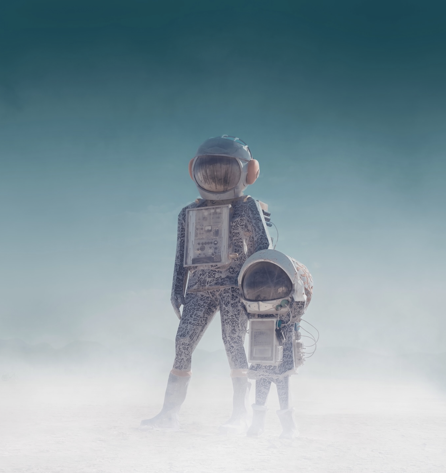 Person wearing a space helmet and a suit covered in graffiti, holding a helmet, standing in a foggy, desolate landscape with a clear sky.