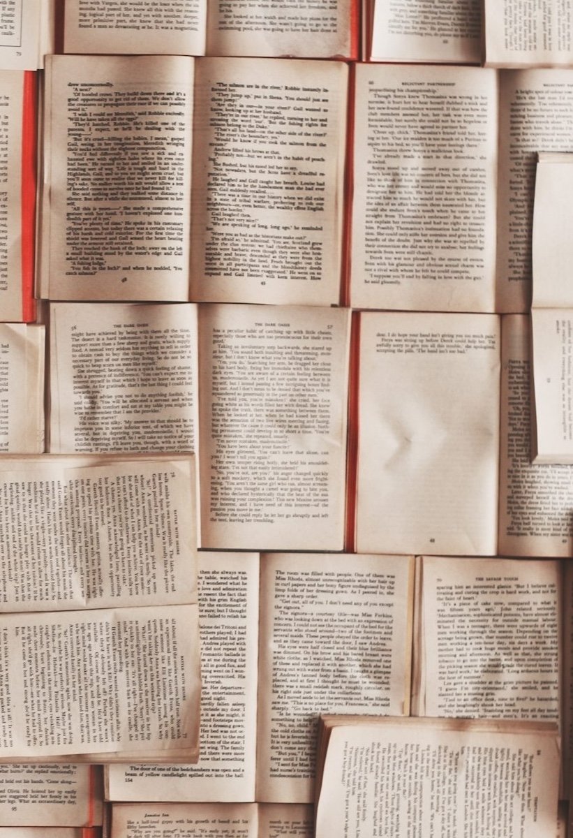 Stack Image of many open books that represents line editing for psychology books