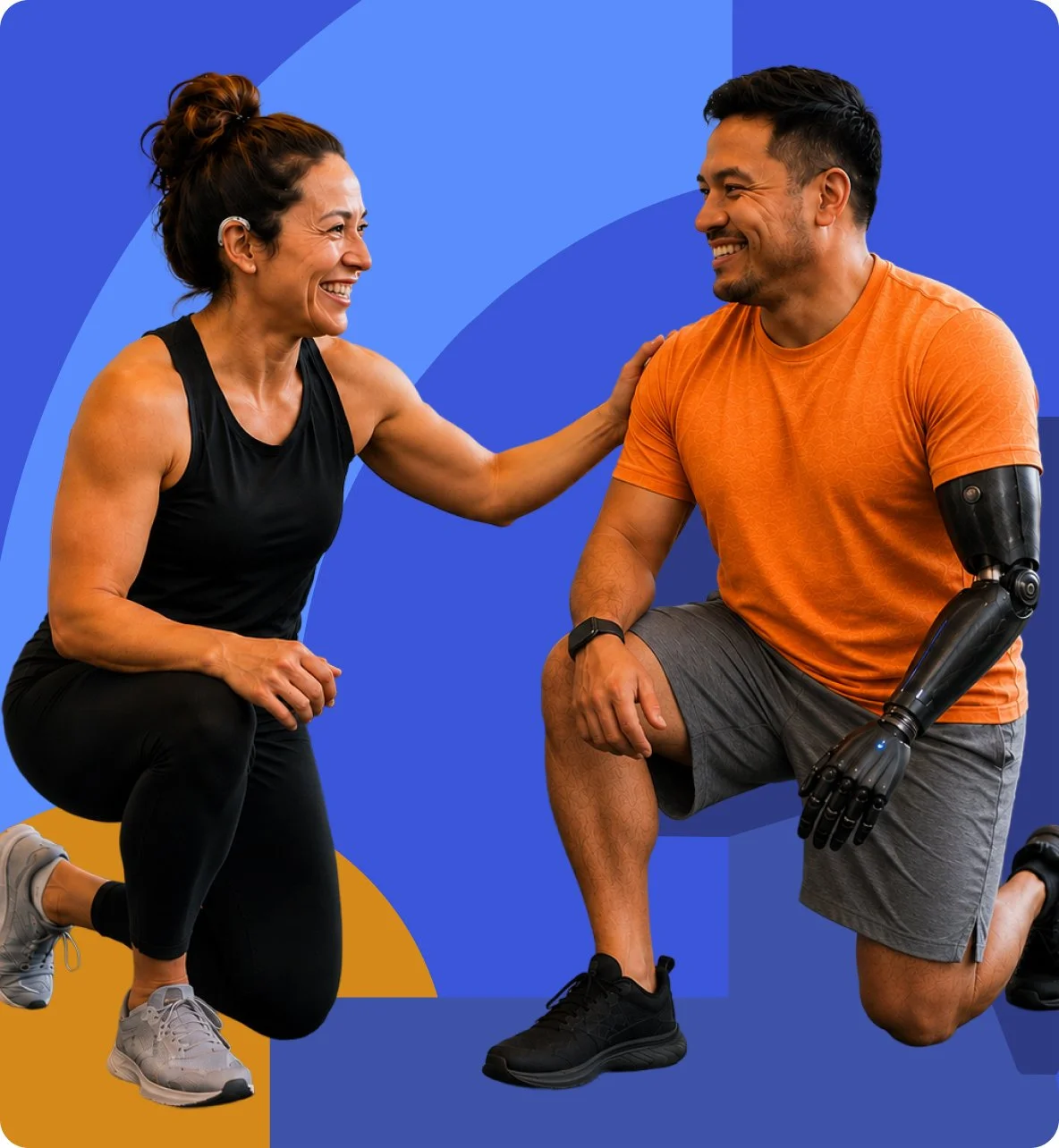 Adaptive fitness trainer smiling with a participant who uses a prosthetic arm