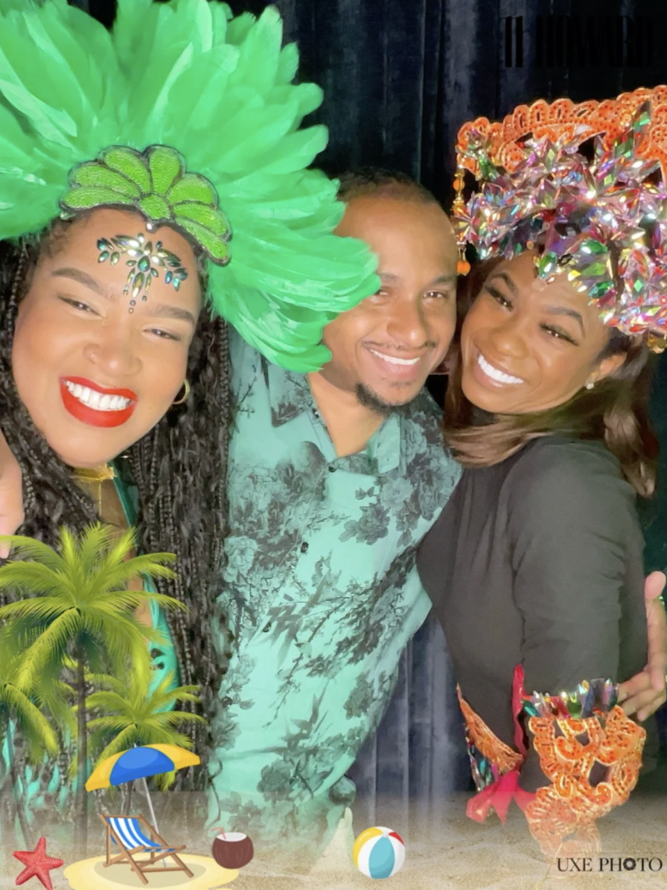 Three people at a festive event wearing colorful costumes and headpieces, with tropical stickers and decorations overlayed.