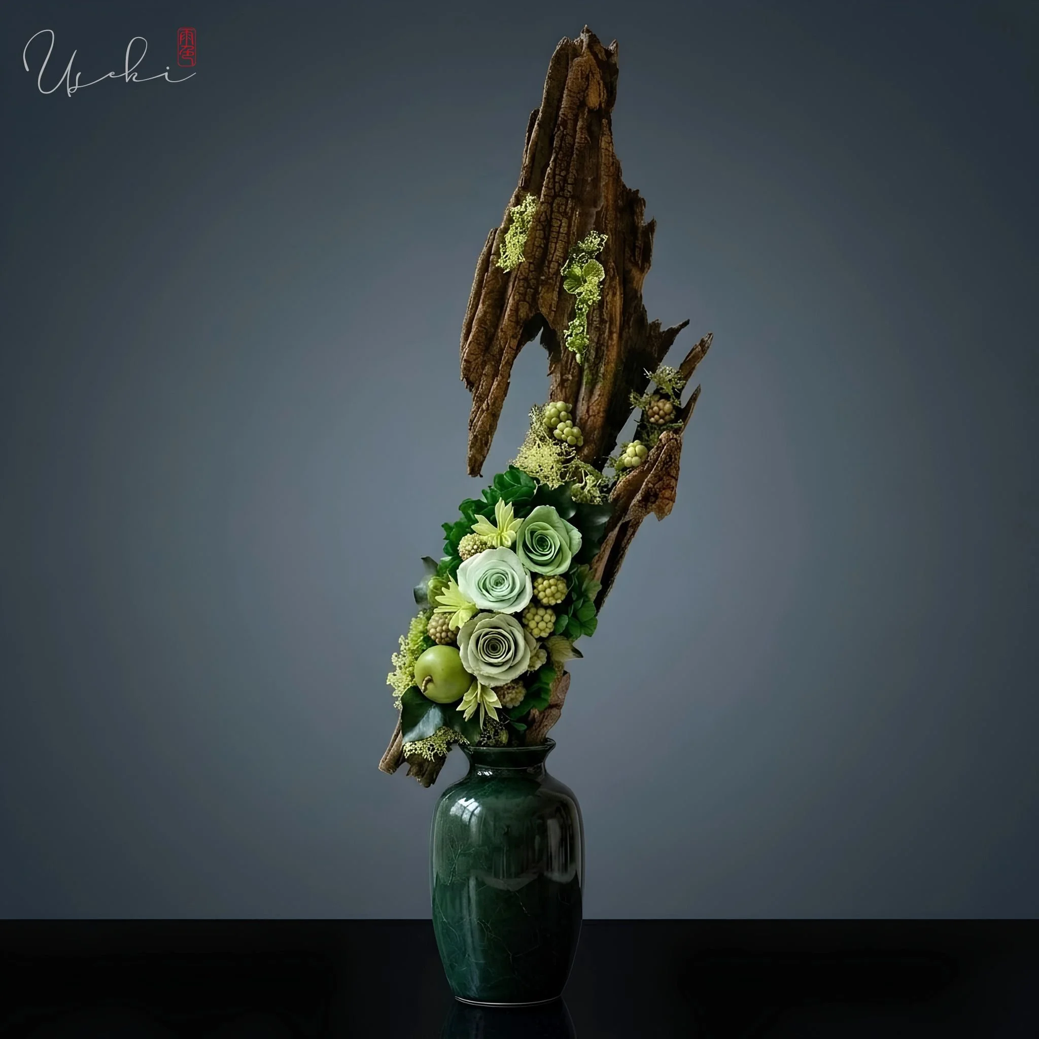 Architectural preserved floral sculpture by USÉKI, focusing on organic wood structures and serene green tones for minimalist interior spaces.