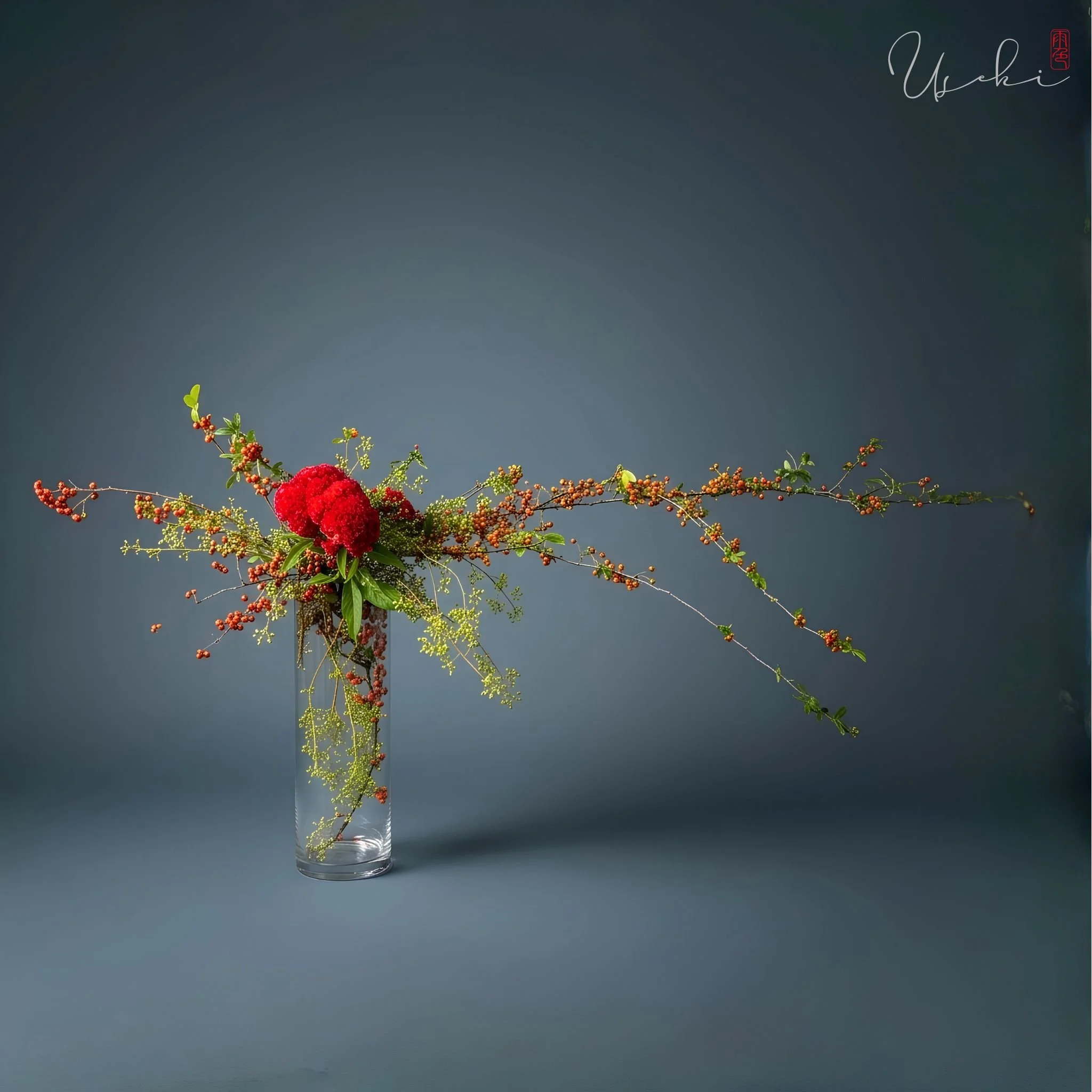 Sogetsu Ikebana floral artwork with bold colors and elegant vine extensions